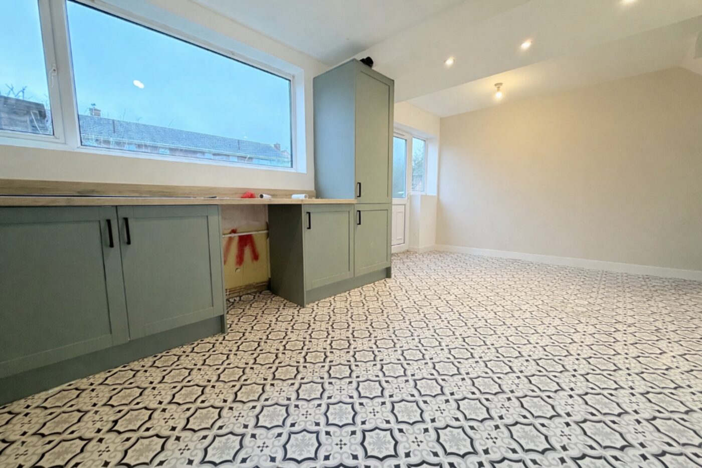 New kitchen with patterned flooring