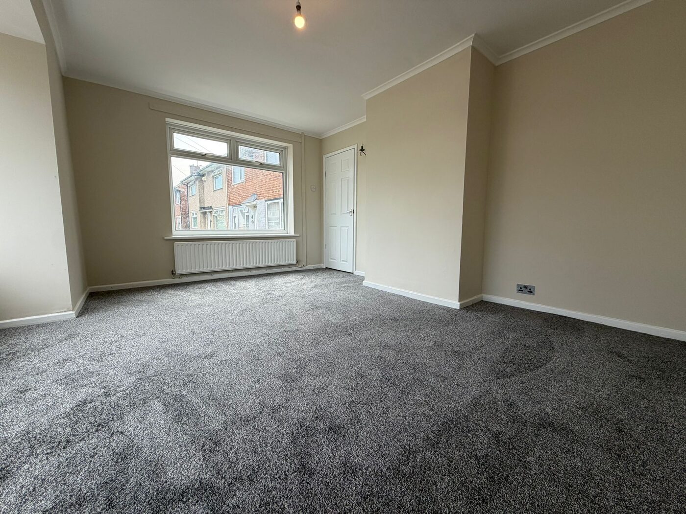 Refurbished second bedroom with new carpet